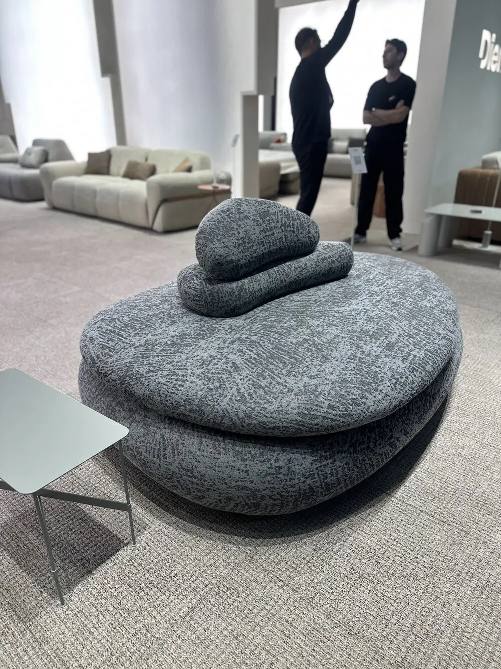 Upholstered seating by Dienne shaped like stacked pebbles